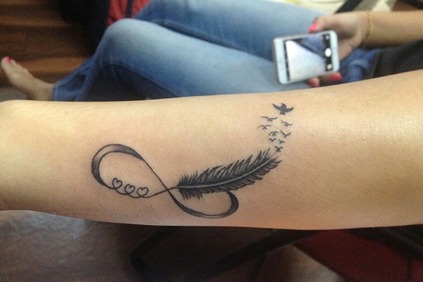 feather vô cực tattoo