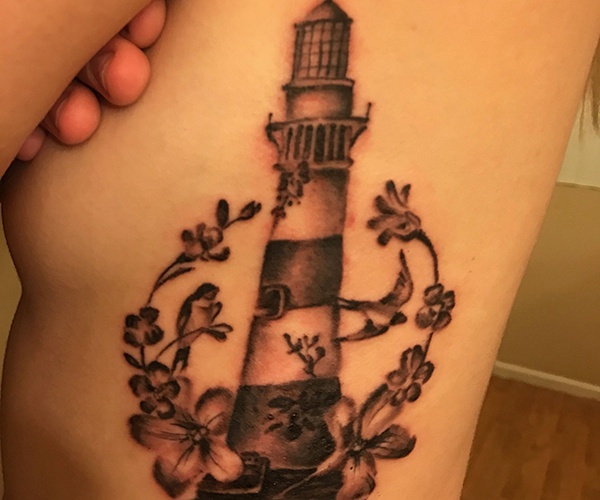 lighthouse and flower tattoo