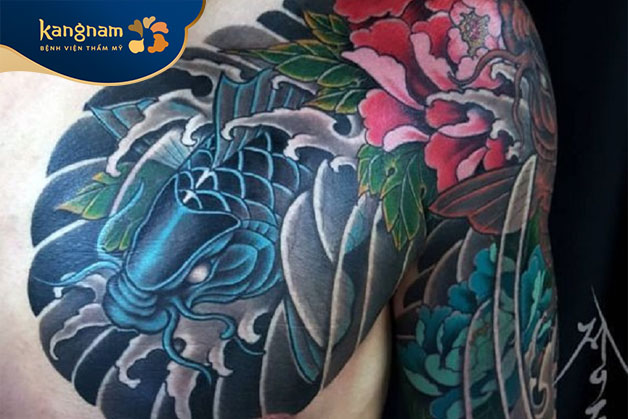 Tattoo cá chép vượt Vũ Môn ở tay đẹp và ấn tượng