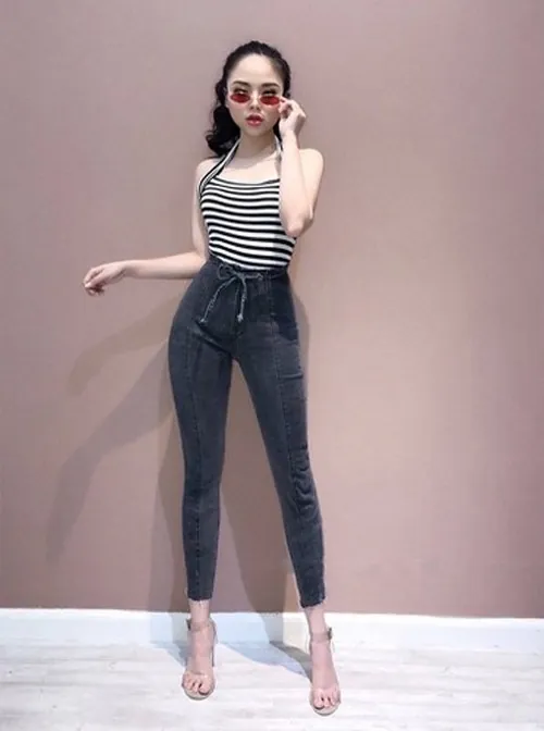 Quần cạp cao tạo nên vòng eo con kiến và che giấu vòng 3 có phần "đồ sộ" khá tốt mẫu chân váy cho người mông to